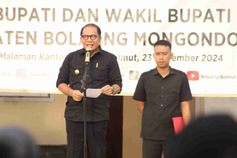 PJ Bupati Bolmut Darwin Muksin