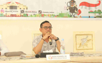 Plt. Ketua Bawaslu Bolmut Rizki Posangi, SH